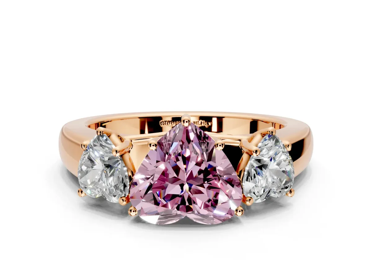 3 Stone Engagement Ring Setting for Fancy Pink Heart-Shaped Center with Raised Basket Heads and Prong Head in Rose Gold