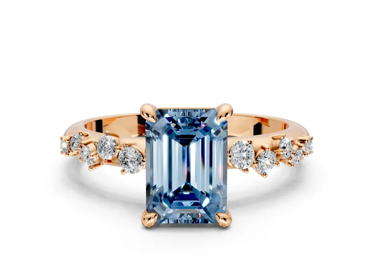 Solitaire Engagement Ring Setting for Fancy Blue Emerald Cut Center with Trailing Leaf Accent Band and Prong Head in Rose Gold