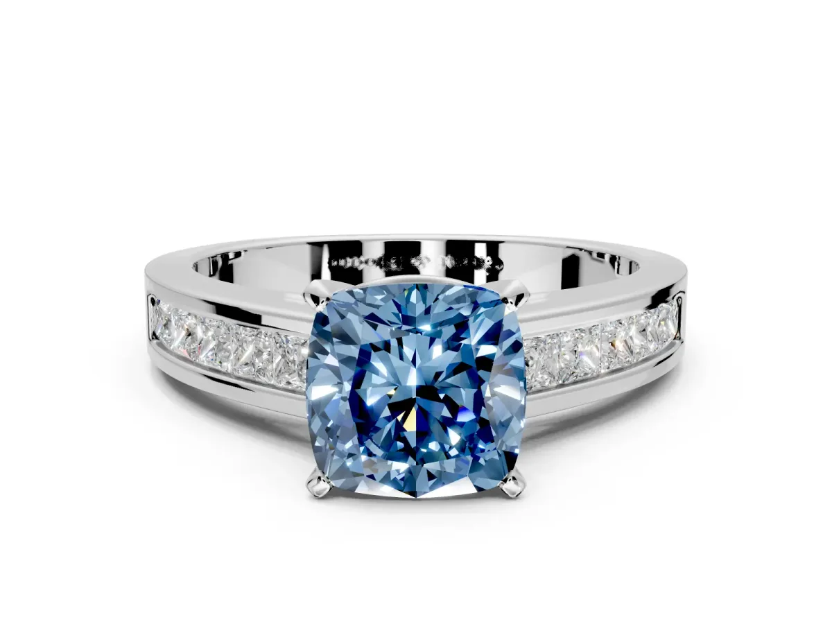 Solitaire Engagement Ring Setting for Fancy Blue Cushion Cut Center with Princess Cut Channel Band and Prong Head in White Gold