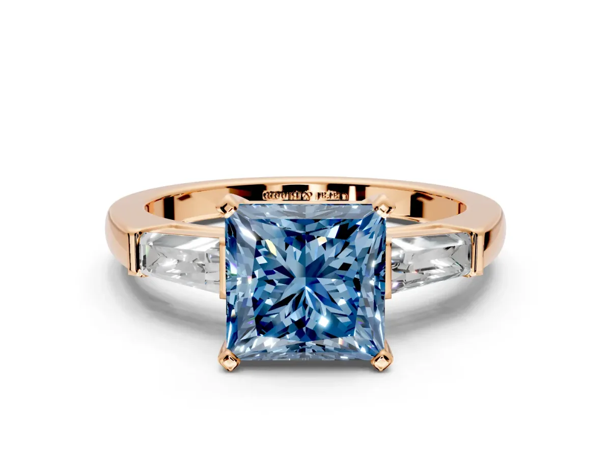 3 Stone Engagement Ring Setting for Fancy Blue Princess Cut Center with Tapered Baguettes, Plain Band and Prong Head in Rose Gold