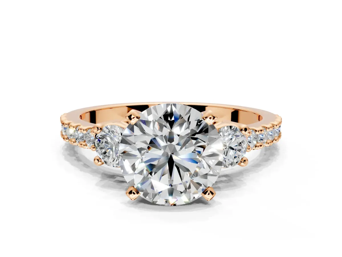 3 Stone Engagement Ring Setting for Round Cut Center with Round Cut Side Accents and Prong Head in Rose Gold