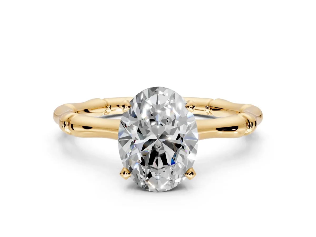 Solitaire Engagement Ring Setting for Oval Center with Bamboo Band and Prong Head in Yellow Gold