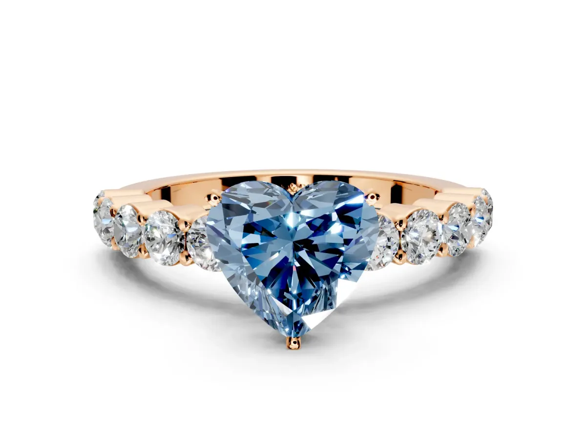 Shared-Prong Engagement Ring Setting for Fancy Blue Heart-Shaped Center with Graduated Accents and Prong Head in Rose Gold