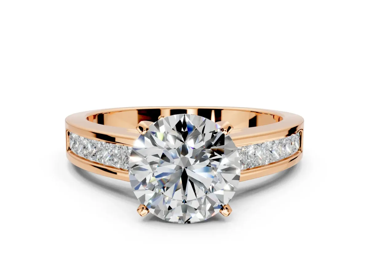 Solitaire Engagement Ring Setting for Round Cut Center with Princess Cut Channel Band and Prong Head in Rose Gold
