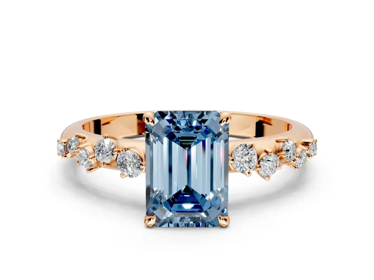 Cluster Engagement Ring Setting for Fancy Blue Emerald Cut Center with Round Cut Accent Band and Prong Head in Rose Gold