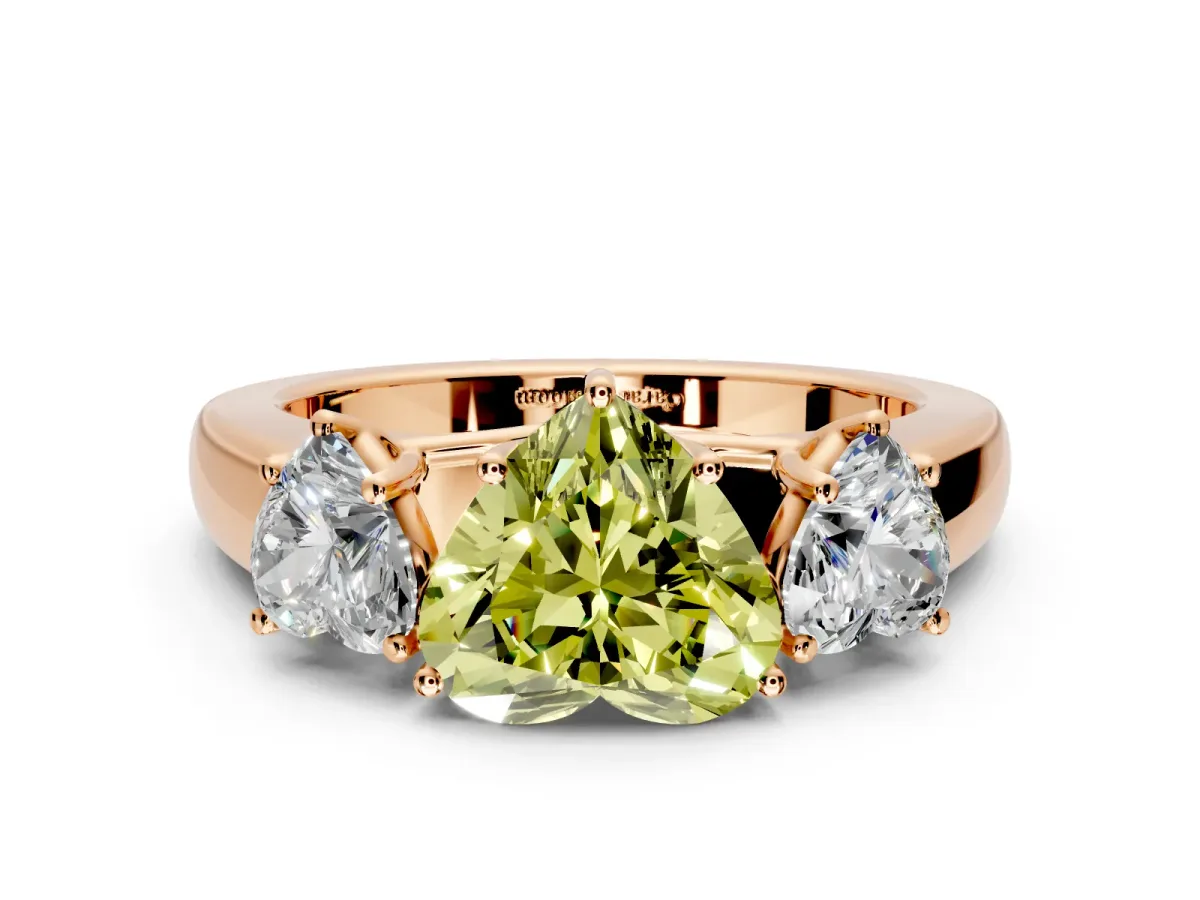 3 Stone Engagement Ring Setting for Fancy Yellow Heart-Shaped Center with Raised Basket Heads and Prong Head in Rose Gold