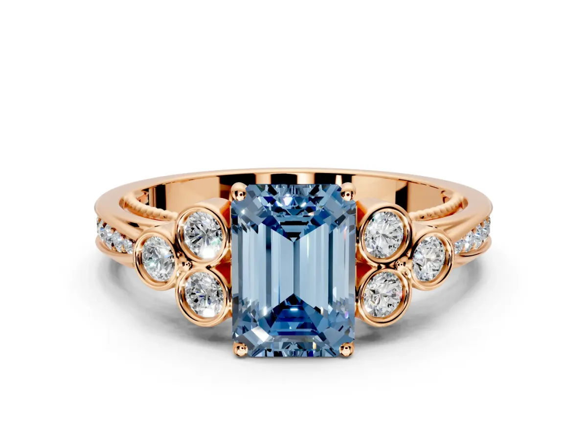 Cluster Engagement Ring Setting for Fancy Blue Emerald Cut Center with Bezel Accent Clusters and Prong Head in Rose Gold