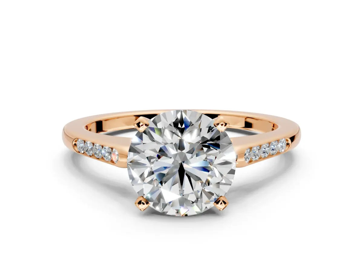 Solitaire Engagement Ring Setting for Round Cut Center with Channel Accents and Prong Head in Rose Gold