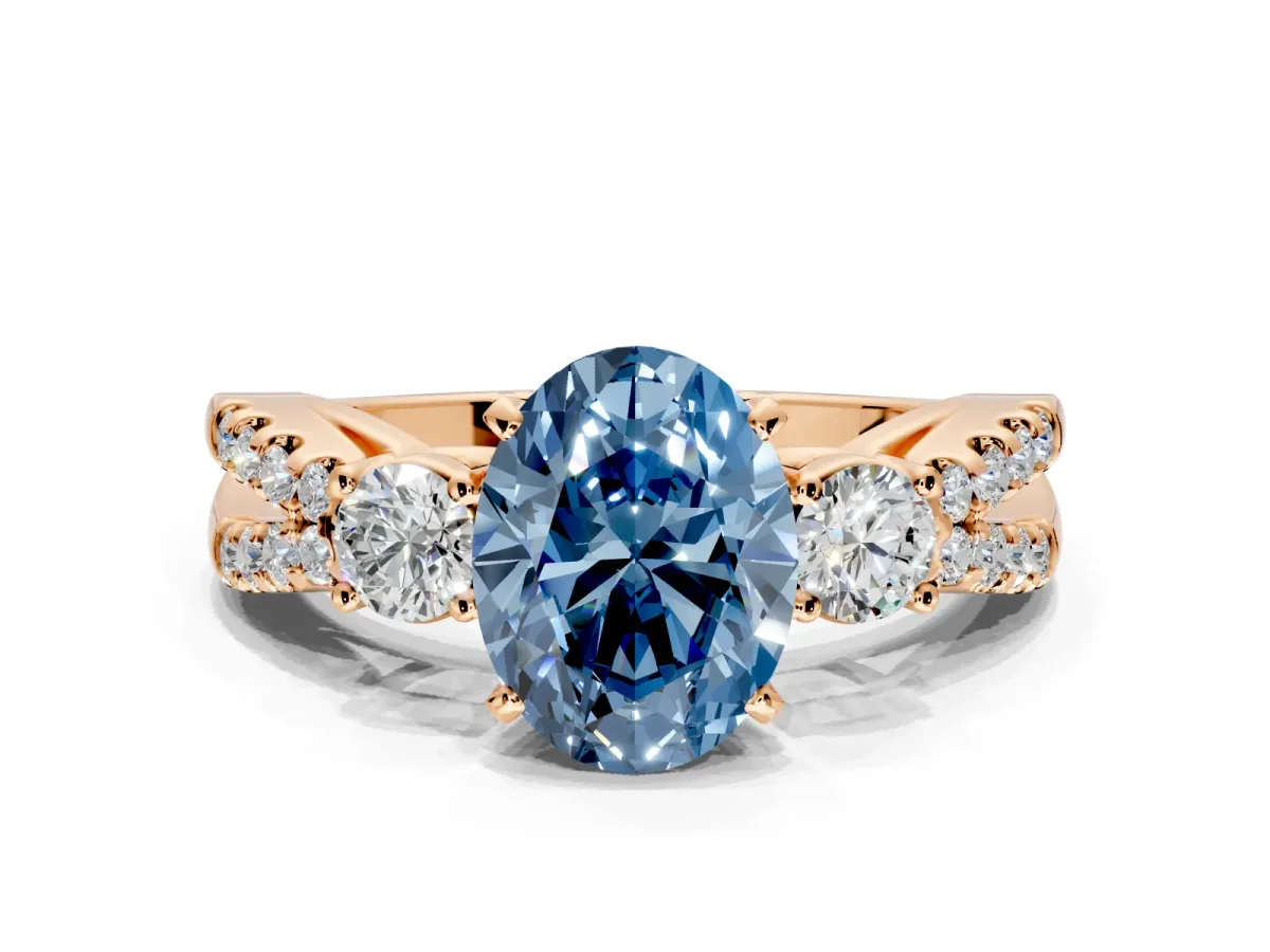 3 Stone Engagement Ring Setting for Fancy Blue Oval Center with Pave Split Shank and Prong Head in Rose Gold
