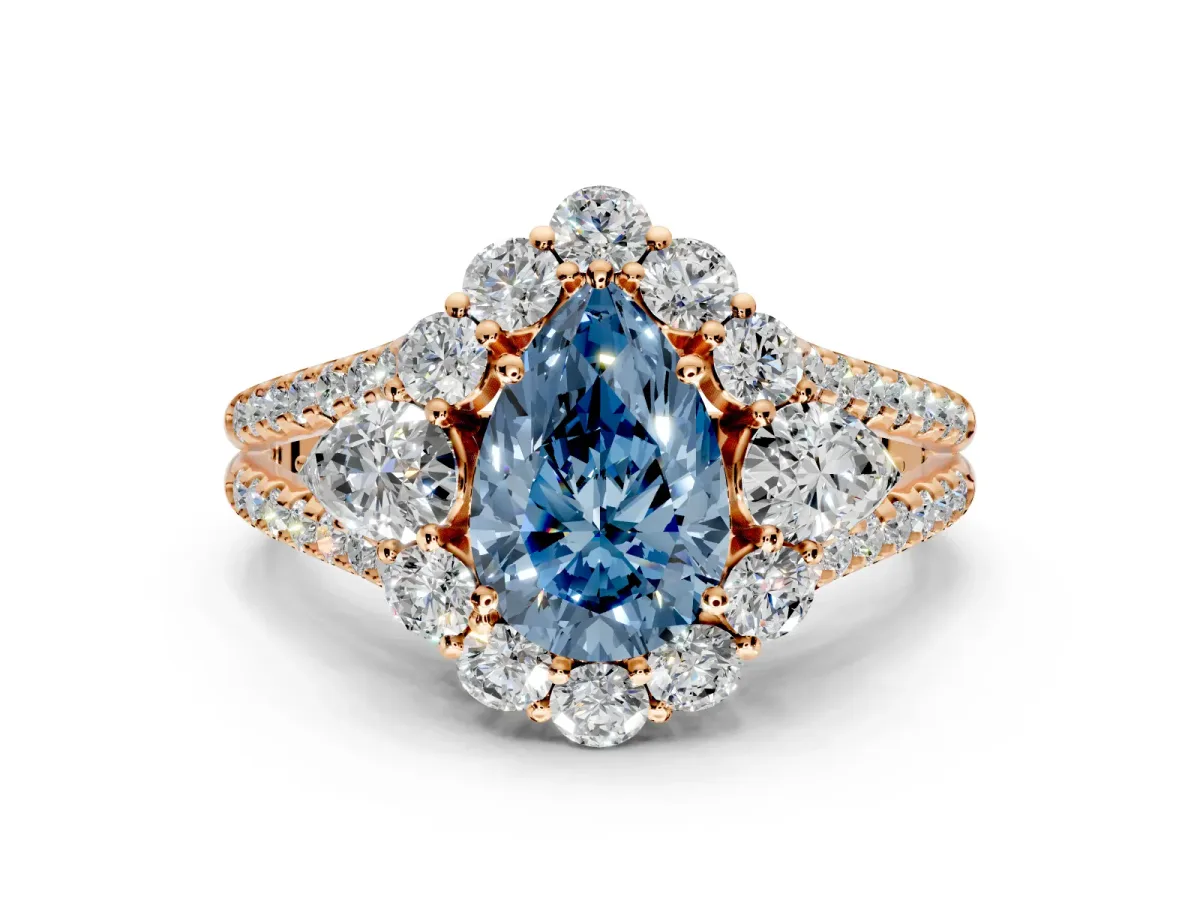 Halo Engagement Ring Setting for Fancy Blue Pear-Shaped Center with Two-Strand Split Shank and Prong Head in Rose Gold