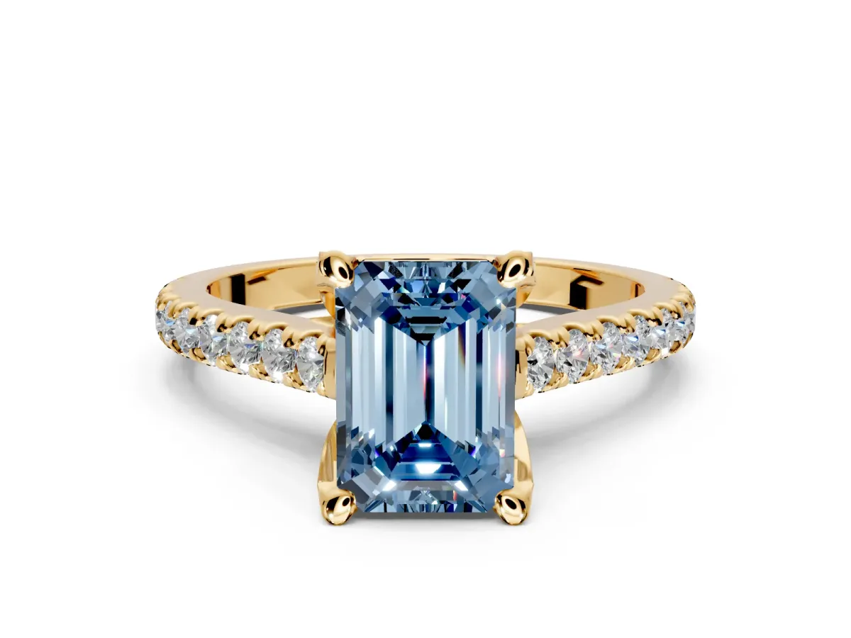 Solitaire Engagement Ring Setting for Fancy Blue Emerald Cut Center with Widening Pave Band and Claw Prong Head in Yellow Gold