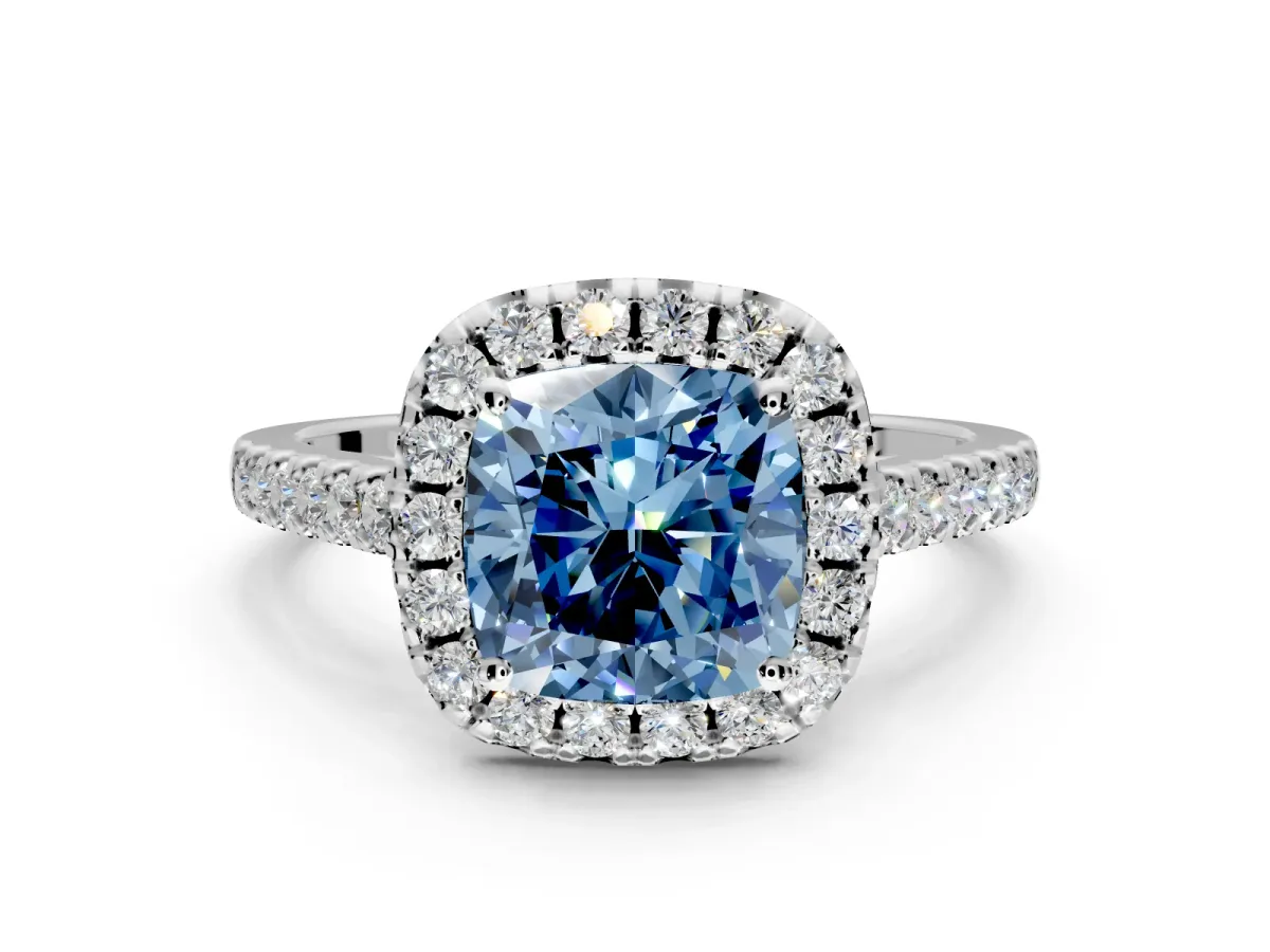 Halo Engagement Ring Setting for Fancy Blue Cushion Cut Center with Raised Halo, Pave Band and Prong Head in White Gold