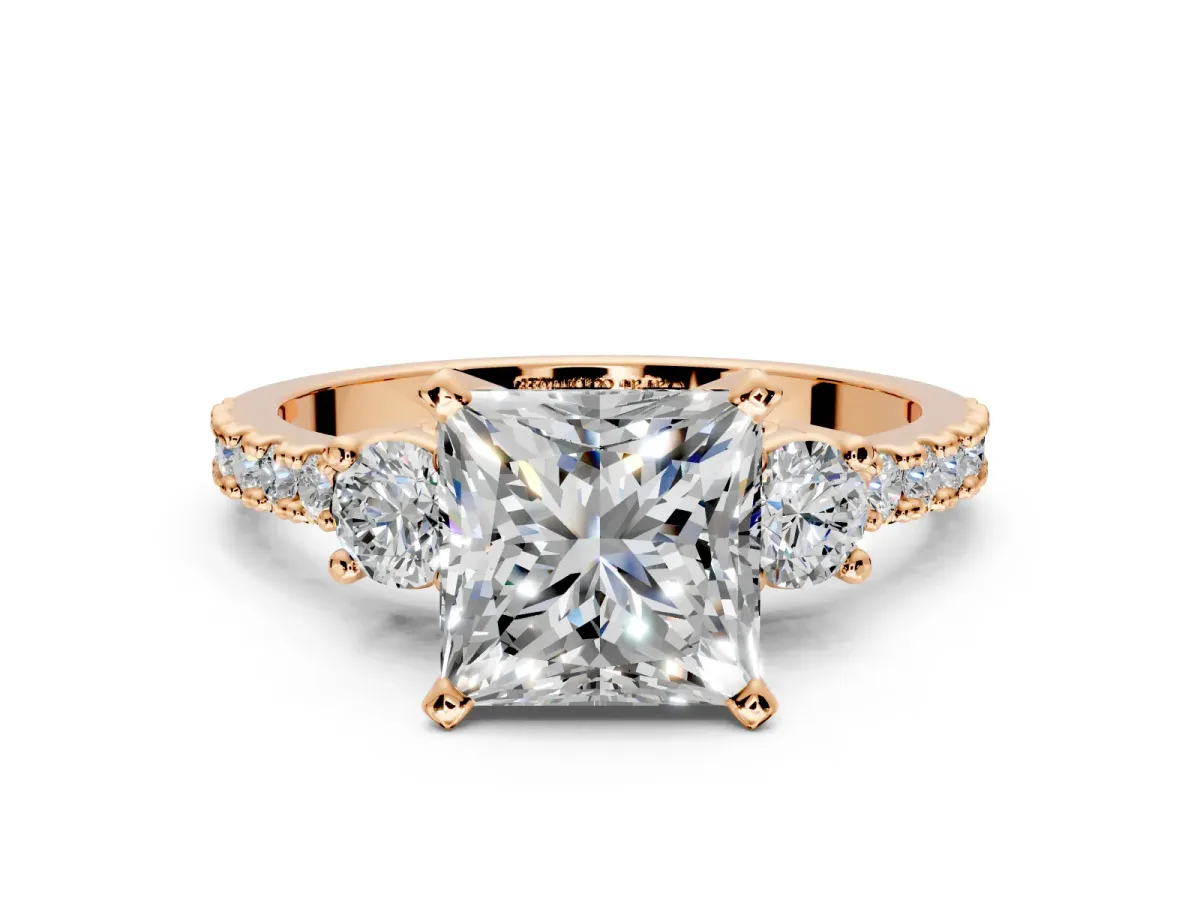 3 Stone Engagement Ring Setting for Princess Cut Center with Round Cut Side Accents and Prong Head in Rose Gold