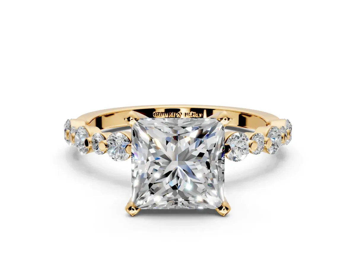 Solitaire Engagement Ring Setting for Princess Cut Center with Alternating Size Accents and Prong Head in Yellow Gold