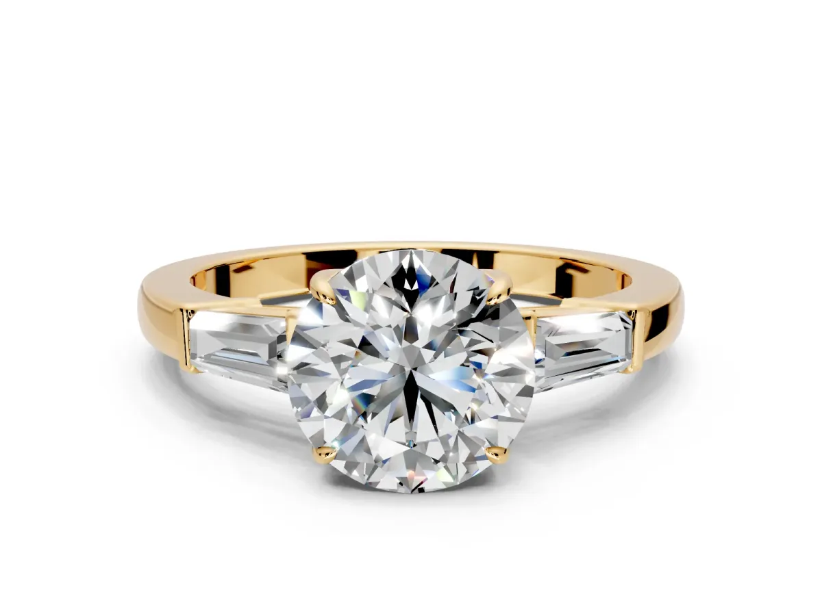 3 Stone Engagement Ring Setting for Round Cut Center with Baguette Accents and Prong Head in Yellow Gold