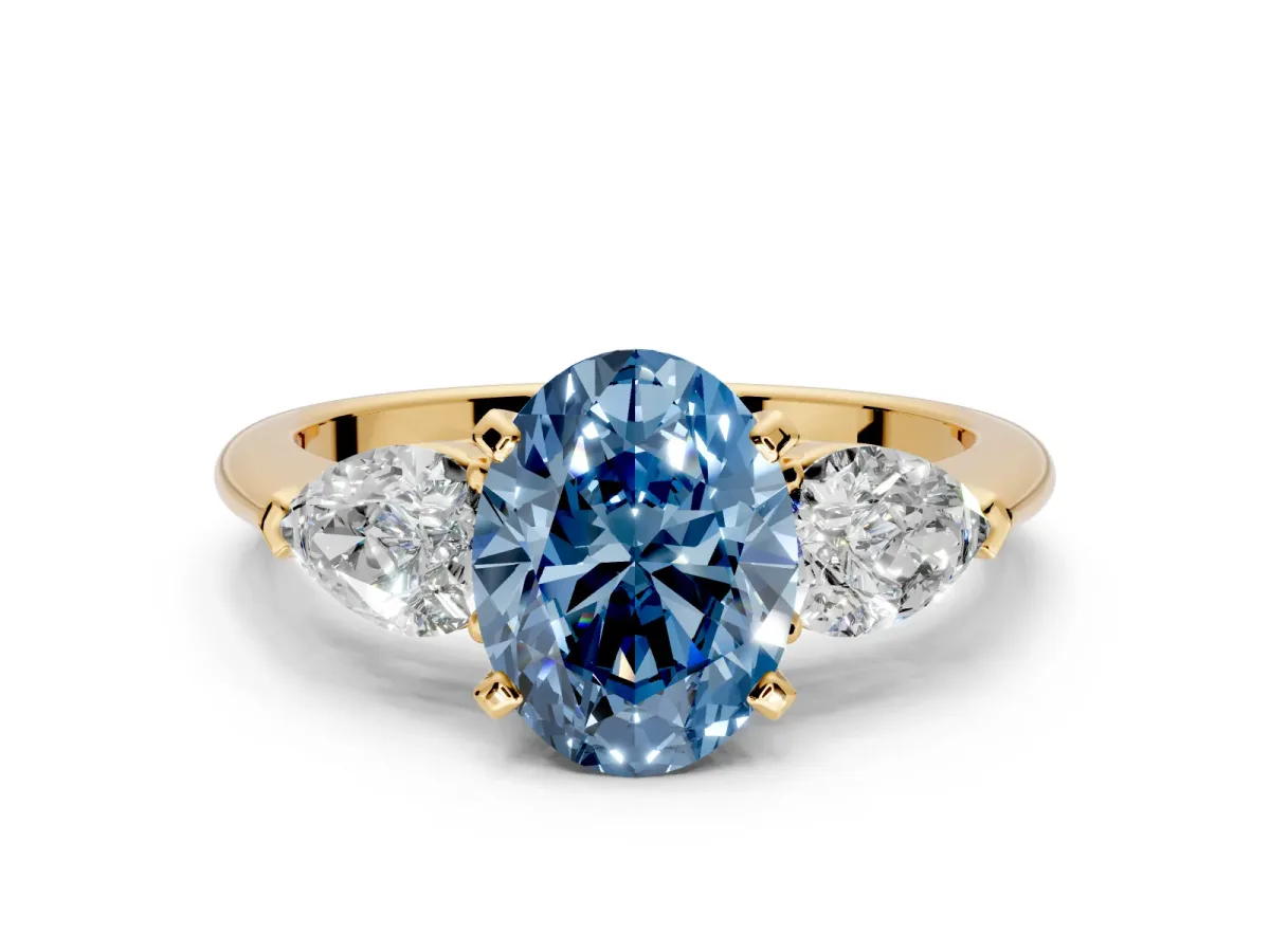 3 Stone Engagement Ring Setting for Fancy Blue Oval Center with Large Pear-Shaped Accents and Prong Head in Yellow Gold