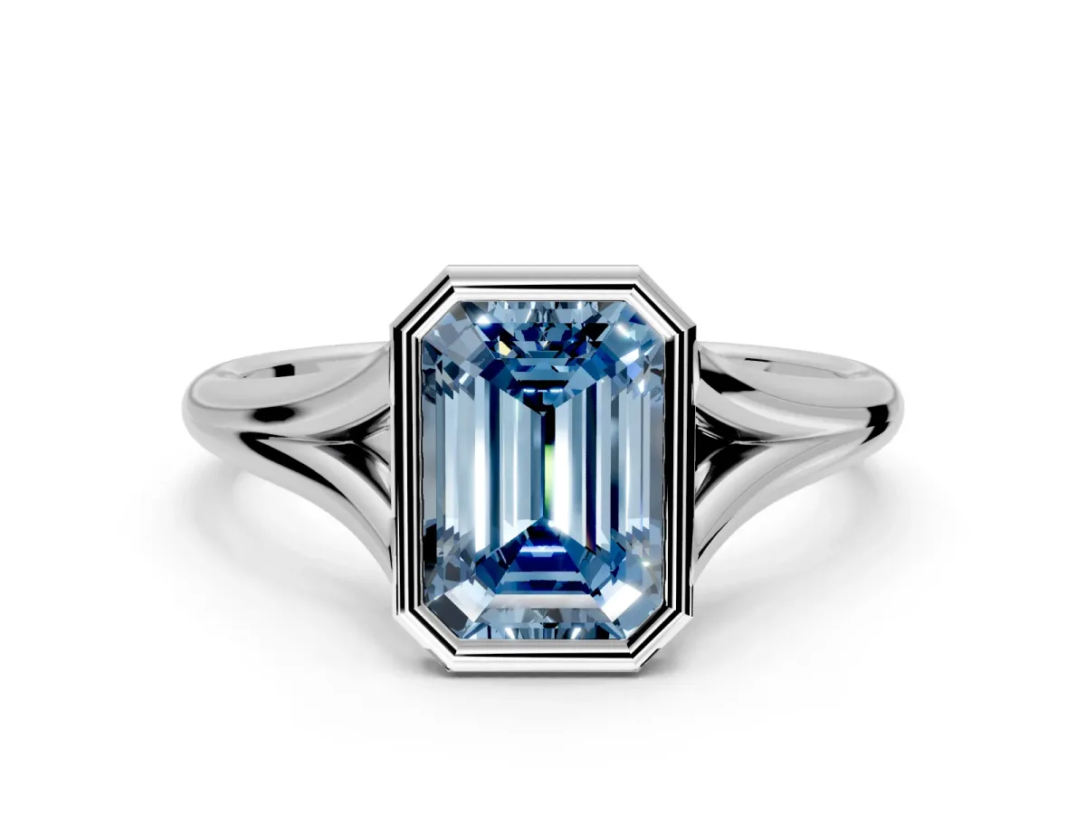 Solitaire Engagement Ring Setting for Fancy Blue Emerald Cut Center with V Split Shank and Bezel Head in Platinum