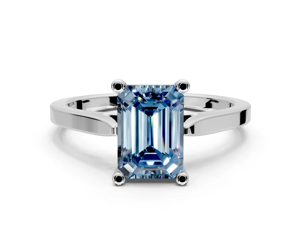 Solitaire Engagement Ring Setting for Fancy Blue Emerald Cut Center with Tapered Shoulders and Prong Head in Sterling Silver