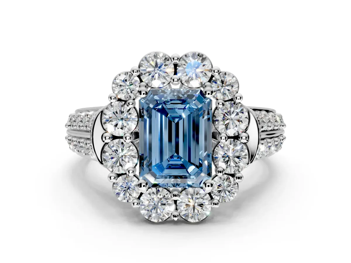 Large Accent Halo Engagement Ring Setting for Fancy Blue Emerald Cut Center with Pave Split Shank and Prong Head in Sterling Silver