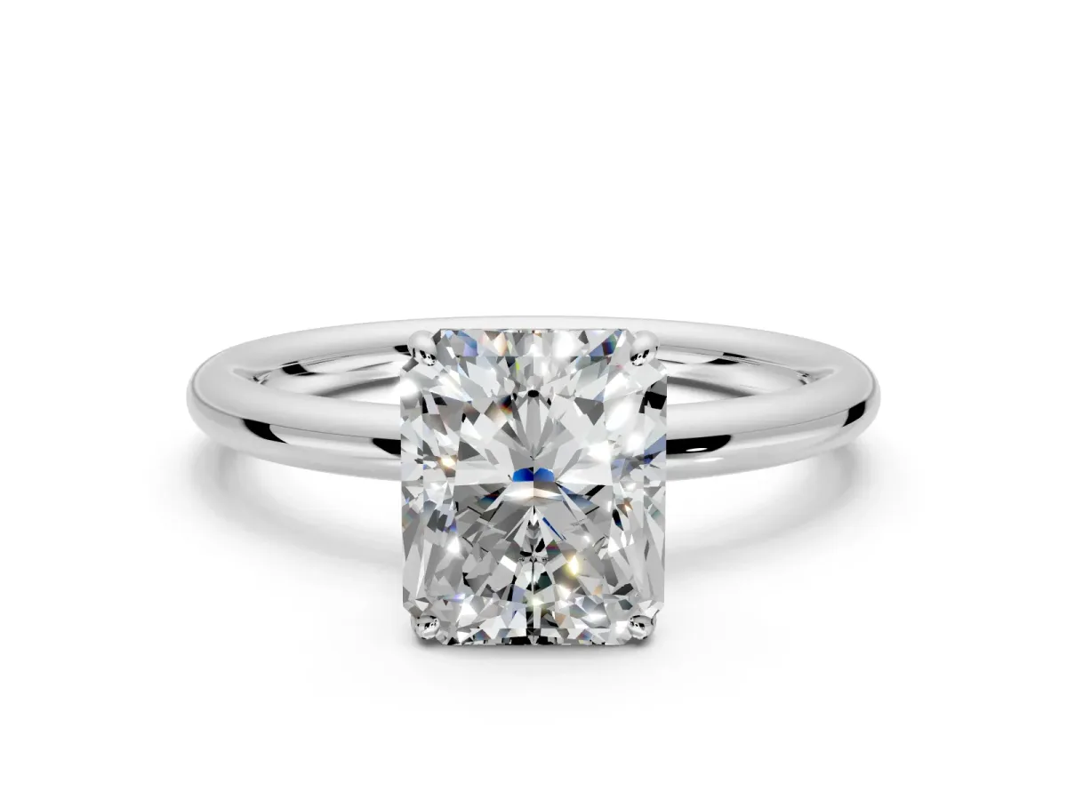 Low-Set Solitaire Engagement Ring Setting for Radiant Cut Center with Thin Plain Band and Prong Head in Platinum