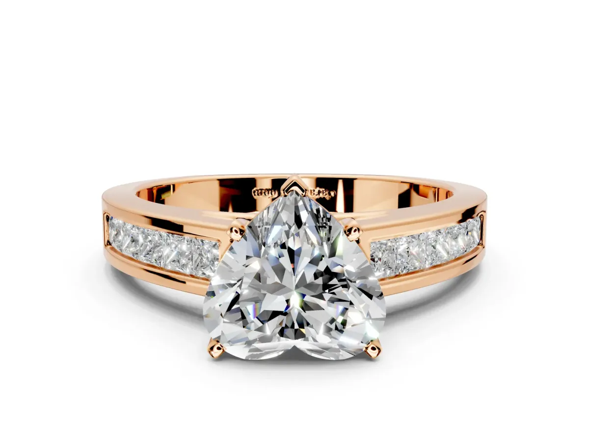 Solitaire Engagement Ring Setting for Heart-Shaped Center with Princess Cut Channel Band and Prong Head in Rose Gold