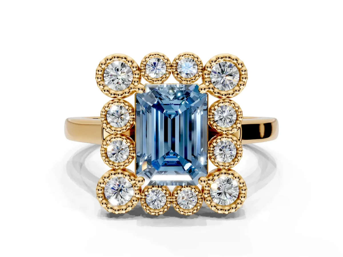 Cluster Halo Engagement Ring Setting for Fancy Blue Emerald Cut Center with Milgrain Bezel Accents and Prong Head in Yellow Gold