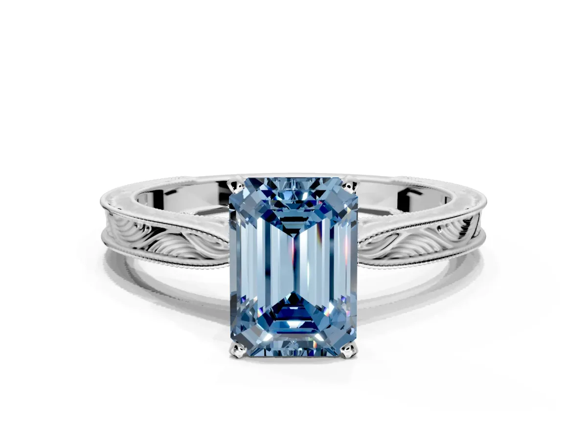 Solitaire Engagement Ring Setting for Fancy Blue Emerald Cut Center with Engraved Milgrain Band and Prong Head in White Gold