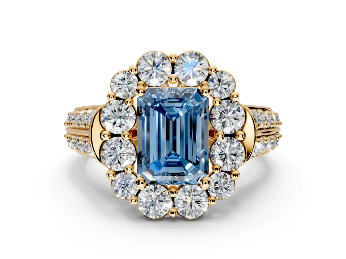Large Accent Halo Engagement Ring Setting for Fancy Blue Emerald Cut Center with Pave Split Shank and Prong Head in Yellow Gold