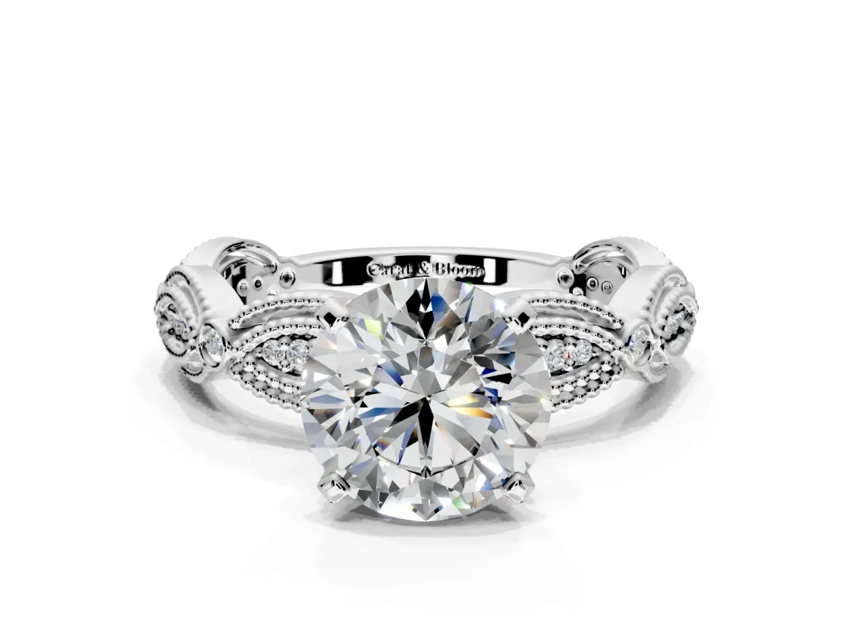 Solitaire Engagement Ring Setting for Round Cut Center with Marquise Panel Band and Prong Head in Platinum