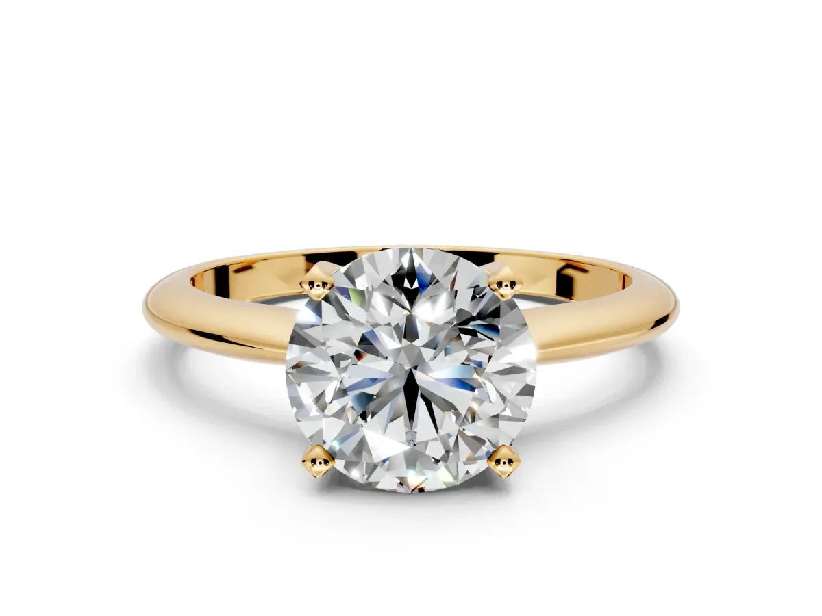 Solitaire Engagement Ring Setting for Round Cut Center with Knife Ridge Band and Claw Prong Head in Yellow Gold