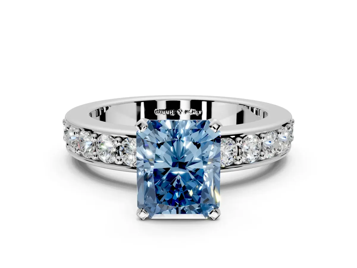 Solitaire Engagement Ring Setting for Fancy Blue Radiant Cut Center with Channel-Set Accents and Prong Head in Platinum