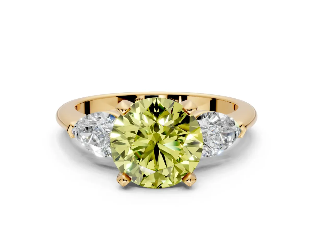 3 Stone Engagement Ring Setting for Fancy Yellow Round Cut Center with Large Pear-Shaped Accents and Prong Head in Yellow Gold
