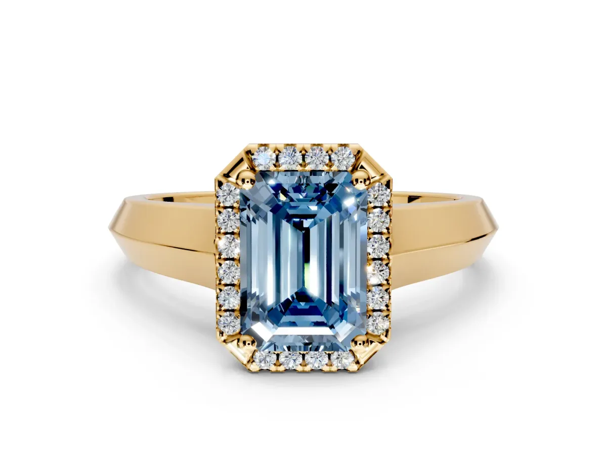 Halo Engagement Ring Setting for Fancy Blue Emerald Cut Center with Knife Ridge Cathedral Band and Prong Head in Yellow Gold