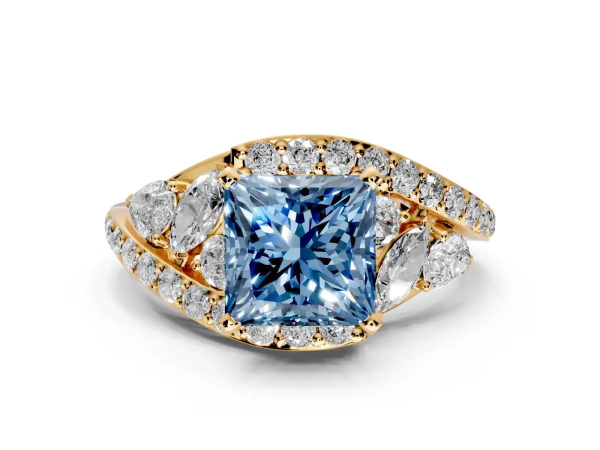 Halo Engagement Ring Setting for Fancy Blue Princess Cut Center with Marquise and Pave Bypass Band and Prong Head in Yellow Gold