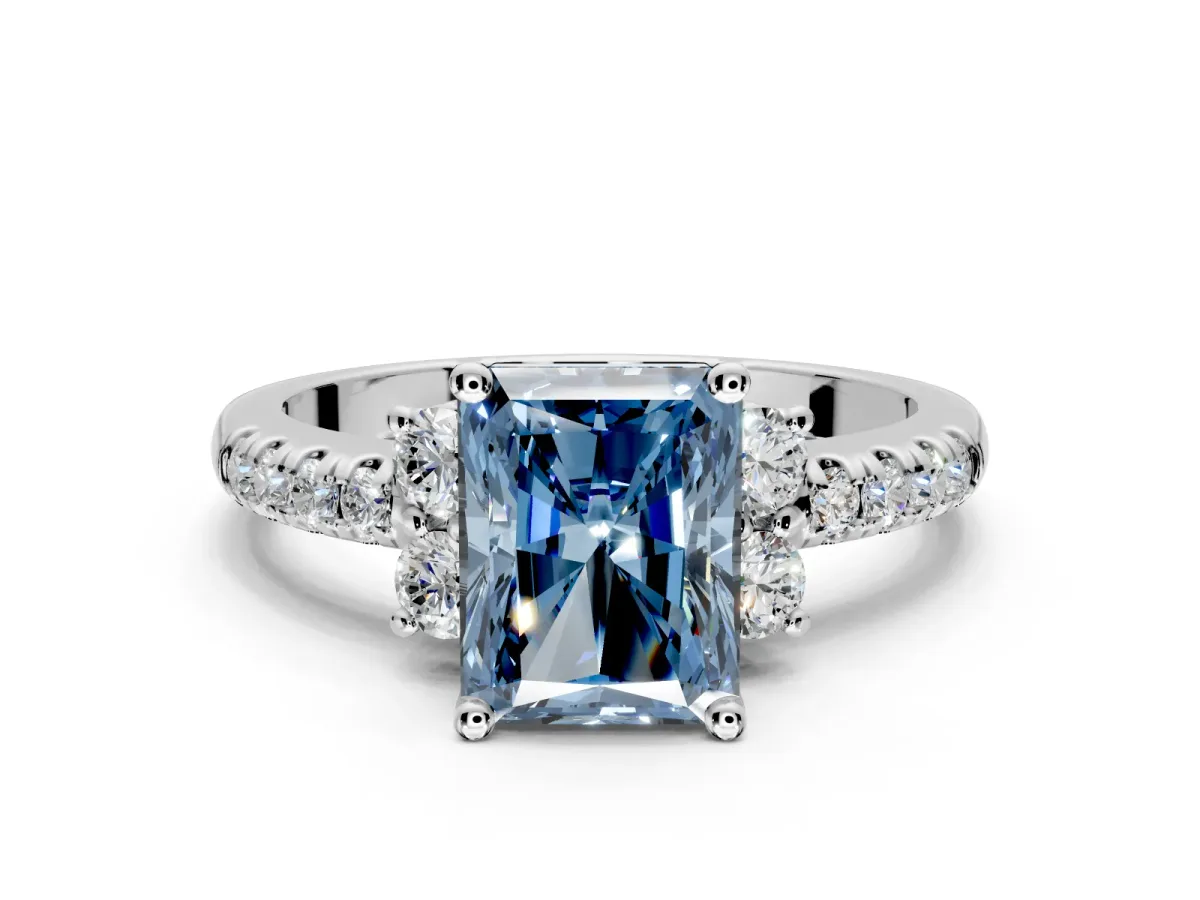 Paired Accent Engagement Ring Setting for Fancy Blue Radiant Cut Center with Pave Band and Prong Head in Platinum