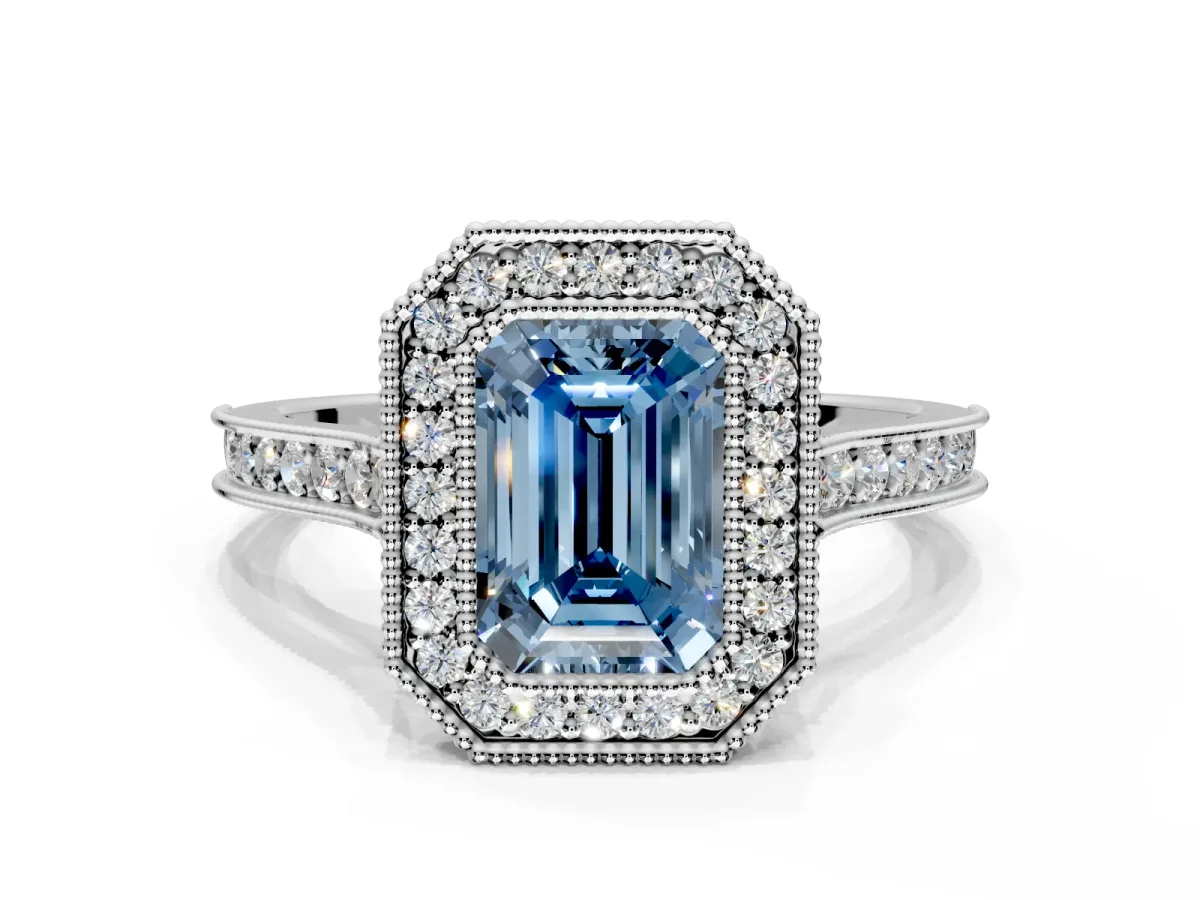 Halo Engagement Ring Setting for Fancy Blue Emerald Cut Center with Milgrain Pave Band and Bezel Head in Platinum