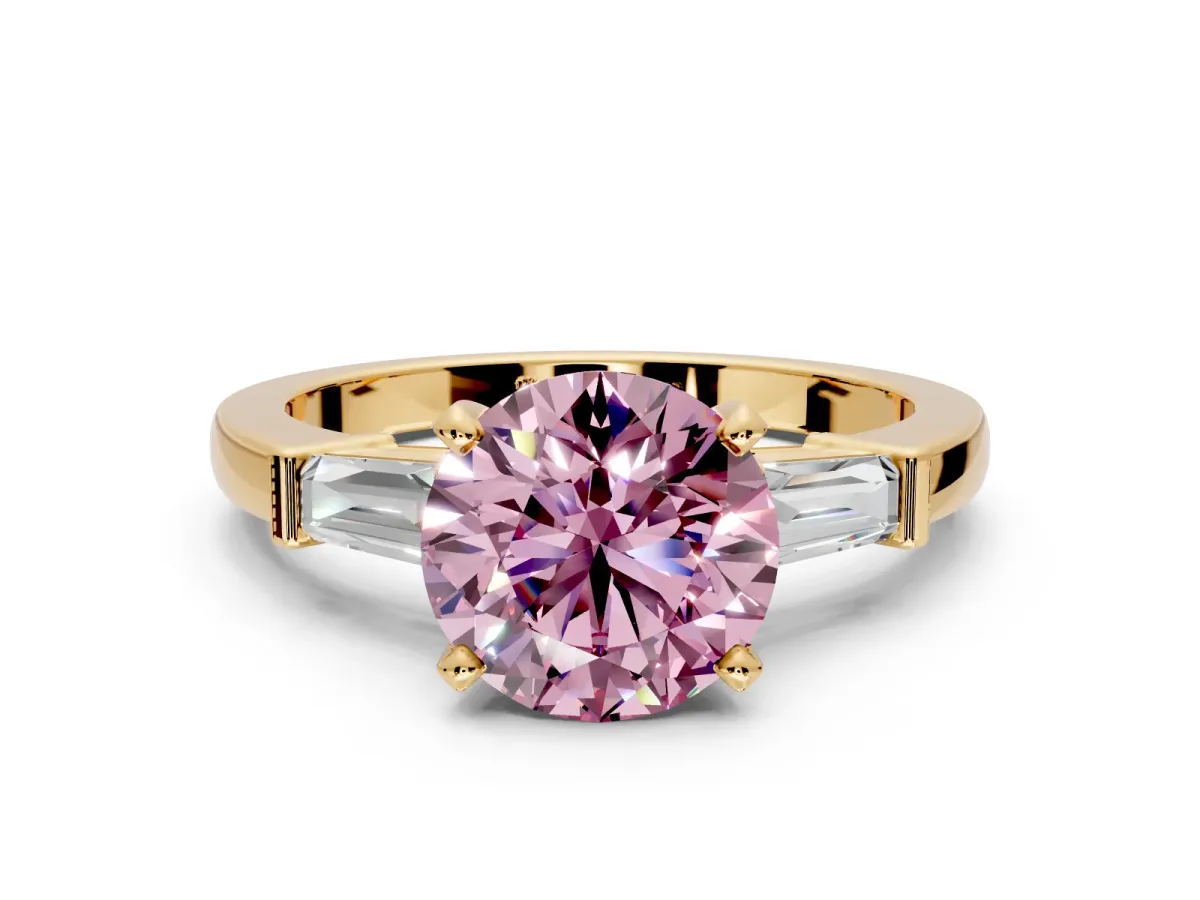 3 Stone Engagement Ring Setting for Fancy Pink Round Cut Center with Channel Baguette Accents and Prong Head in Yellow Gold