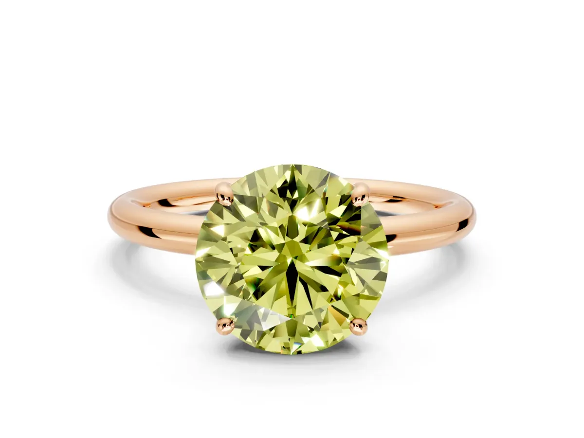 Low-Set Solitaire Engagement Ring Setting for Fancy Yellow Round Cut Center with Thin Plain Band and Prong Head in Rose Gold