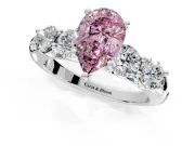 5 Stone Engagement Ring Setting for Fancy Pink Pear-Shaped Center with Graduated Accents and Prong Head in Platinum