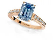 Solitaire Engagement Ring Setting for Fancy Blue Emerald Cut Center with Crossover Accents and Prong Head in Rose Gold