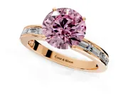 Solitaire Engagement Ring Setting for Fancy Pink Round Cut Center with Channel Baguette Band and Prong Head in Rose Gold