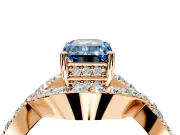 Halo Engagement Ring Setting for Fancy Blue Emerald Cut Center with Pave Infinity Twist Band and Prong Head in Rose Gold
