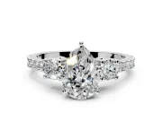 3 Stone Engagement Ring Setting for Pear-Shaped Center with Round Cut Side Accents and Prong Head in Platinum