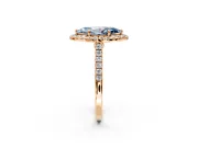 Halo Engagement Ring Setting for Fancy Blue Marquise Center with Narrowing Pave Band and Prong Head in Rose Gold