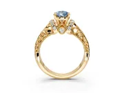 Solitaire Engagement Ring Setting for Fancy Blue Pear-Shaped Center with Filigree Accent Basket and Prong Head in Yellow Gold