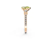 3 Stone Engagement Ring Setting for Fancy Yellow Pear-Shaped Center with Round Cut Side Accents and Prong Head in Rose Gold