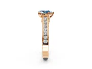 Solitaire Engagement Ring Setting for Fancy Blue Pear-Shaped Center with Channel Band and Double Claw Prong Head in Rose Gold