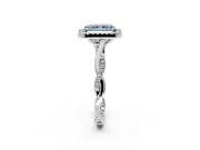 Halo Engagement Ring Setting for Fancy Blue Radiant Cut Center with Twist Band and Prong Head in Platinum