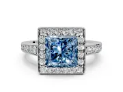 Bezel-Framed Halo Engagement Ring Setting for Fancy Blue Princess Cut Center with Pave Band and Prong Head in White Gold