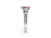 Channel-Set Engagement Ring Setting for Fancy Pink Pear-Shaped Center with Baguette Band and Prong Head in Platinum